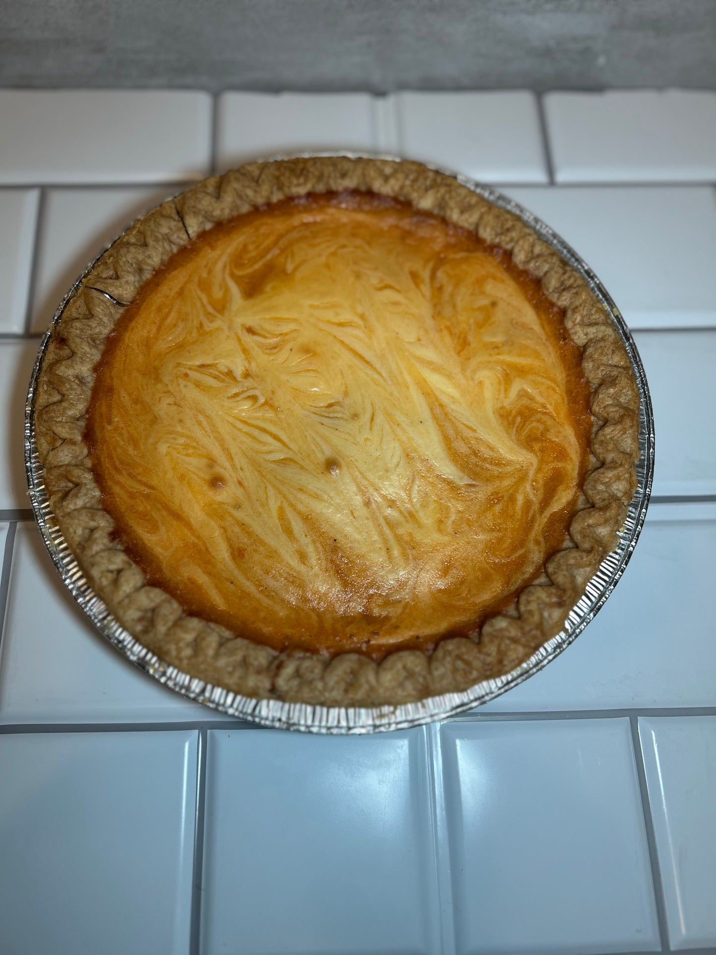 Sweet Potato Pie with cheesecake swirls