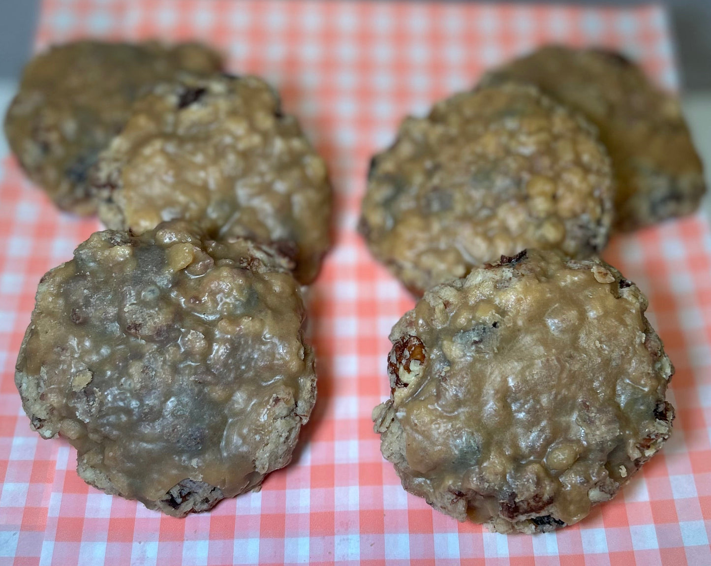 Oatmeal Raisin Pecan Chocolate Chip Cookies topped with caramel