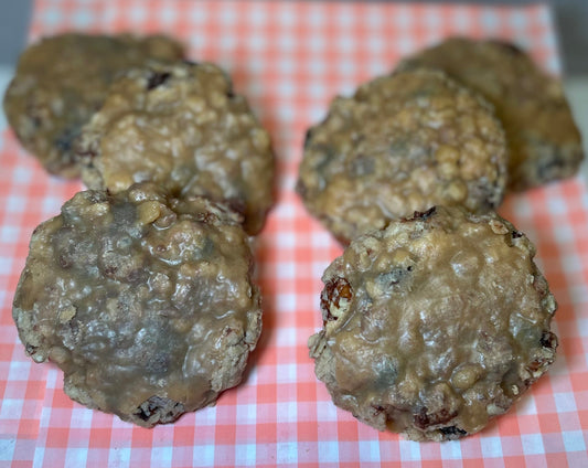 Oatmeal Raisin Pecan Chocolate Chip Cookies topped with caramel